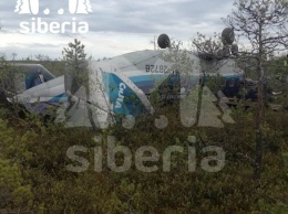 Появились фото самолета, который пропал с радаров и совершил жесткую посадку в Томской области РФ