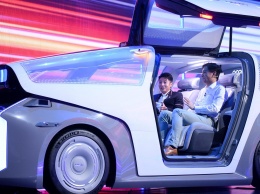 "Китайский Google" показал гибрид робота и автомобиля
