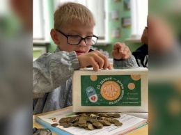 В Никополе школьники присоединились к благотворительной акции "Монетки детям"