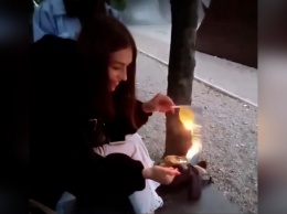 В Каменском 15-летняя девушка сожгла флаг Украины: что ей грозит