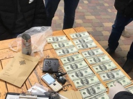 В Киеве задержали торговцев фальшивой валютой