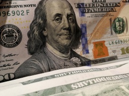По Украине разошлись сотни тысяч фальшивых долларов: их нельзя выявить даже на детекторе валют