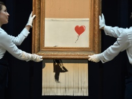 Изрезанную картину Бэнкси продали за 18 миллионов фунтов