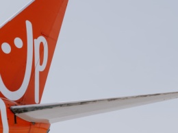 SkyUp задержала вылет на 4 часа, пытаясь усадить пассажирку с Covid-19 в забитый самолет
