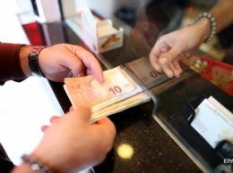 Турецкая лира рекордно упала к доллару