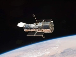 Тройная галактика: телескоп Hubble сделал потрясающее открытие