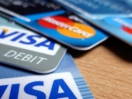 Visa и Mastercard снизили межбанковскую комиссию в Украине