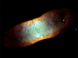 Телескоп Hubble сфотографировал туманность Сетчатка, которая похожа на пончик