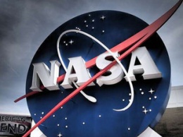 Похож на тигра: ученые NASA запечатлели удивительную особенность спутника Сатурна