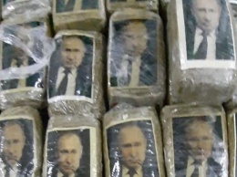 В Ливии на берегу нашли крупную партию гашиша с портретами Путина (ФОТО)