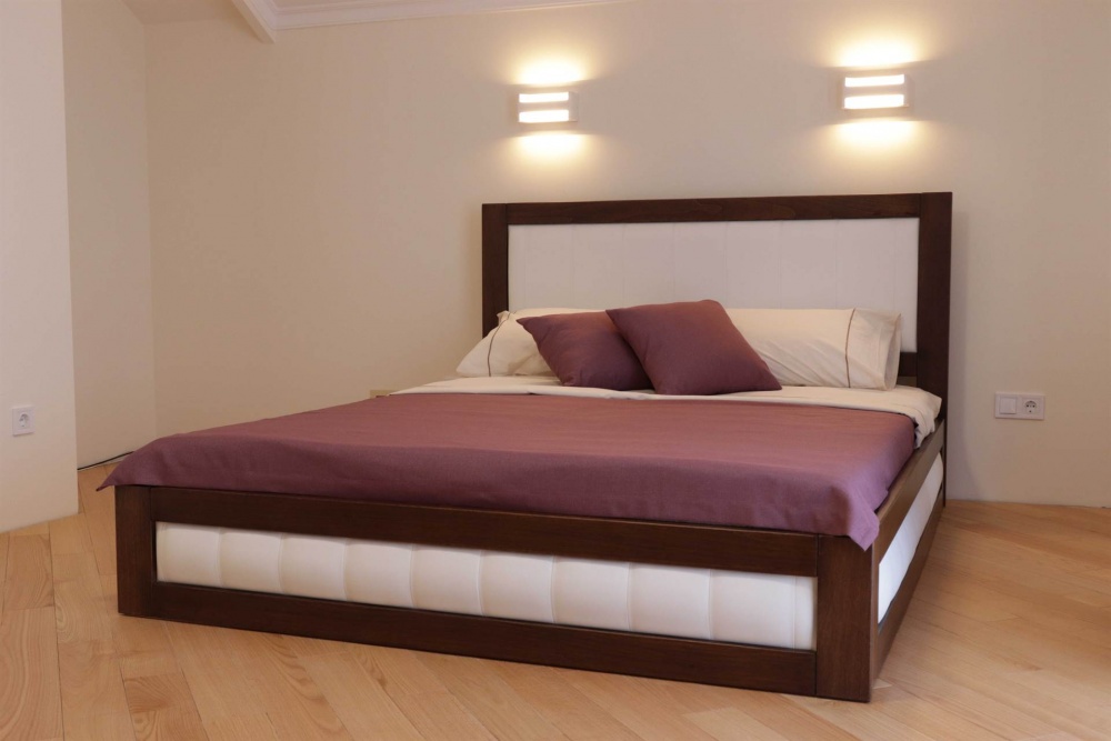 Двуспальные кровати: обзор материалов и дополнительных функций