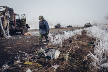 Эксгумированное из братской могилы под Дебальцево тело бойца ВСУ передадут Киеву