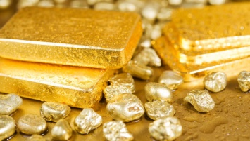 Почему золото дорожает