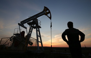Поправки в соглашение о заморозке добычи нефти учитывают позицию Ирана - Bloomberg