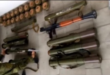 В пригороде Северодонецка в укромном месте припрятали целый арсенал боеприпасов