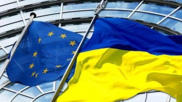Еврокомиссар обещает Украине безвизовый режим с ЕС в 2016 году