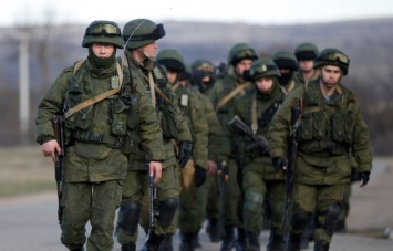 РФ во время аннексии Крыма перебросила на полуостров 9 тыс. военных - официально