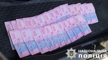 На Днепропетровщине полиция задержала на взятке двух должностных лиц городских советов