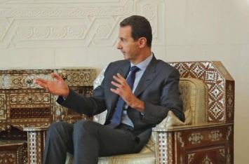 США должны пересмотреть свой подход к Асаду - Reuters