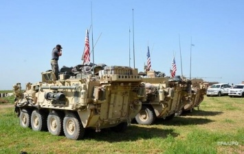 США уходят из Сирии "так, чтобы остаться" - МИД РФ