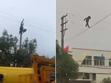 Пьяный китаец гулял по электропроводам на высоте 10 м, пока спасатели не столкнули его вниз