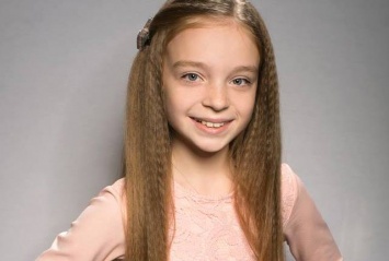 Девочка из Днепропетровщины пожертвовала косой ради больных деток (Фото)