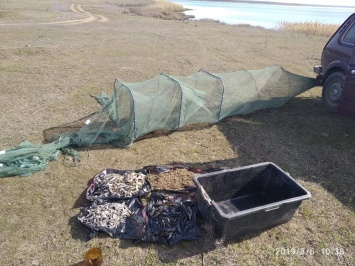 Очередной «улов» Николаевского рыбоохранного патруля: 2 браконьера и бесхозная сеть