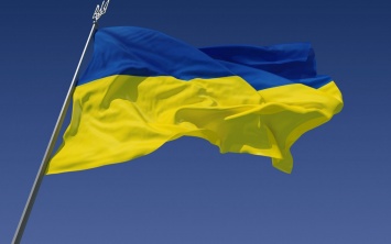 Украинский флаг развевается в центре Донецка: «у орков истерика, массовые обыски»