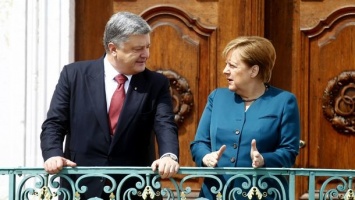 Порошенко и Меркель выступили за "пасхальное перемирие" на Донбассе