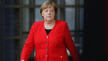 Экс-посол США рассказал о "странной" позиции Меркель по Украине