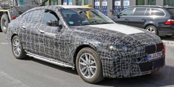 Фотошпионы заглянули внутрь электромобиля BMW i4