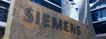 Чистая прибыль компании Siemens сократилась почти на треть
