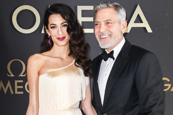 Гламурный выход: Амаль и Джордж Клуни на светской вечеринке в Орландо