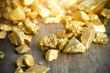 Мировые цены на золото перешли к падению