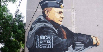 В Крыму на мурале с Путиным неизвестные оставили провокационное послание для ФСБ