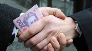 Харьковские полицейские организовали коррупционную схему за счет подчиненных