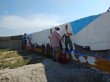 Стену рыбзавода со стороны городского пляж украсят сюжеты из истории Генического района
