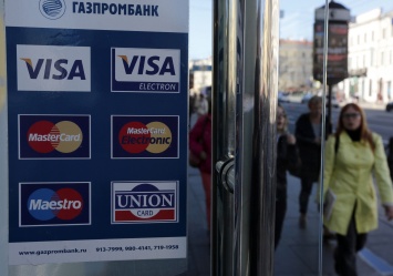 "Коммерсантъ" рассказал о возможном уходе Visa и MasterCard из России