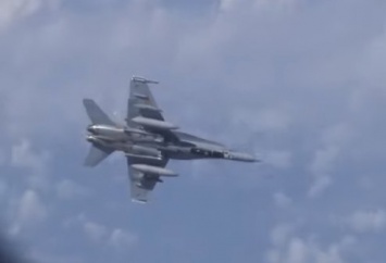 Российские Су-27 отогнали истребитель НАТО от самолета министра обороны Шойгу. ВИДЕО
