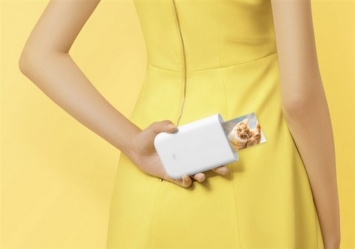 Xiaomi Mi Pocket Photo Printer печатает фото с мобильных устройств