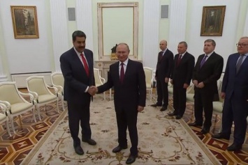 Путин заверил президента Венесуэлы в поддерке и пообещал ему помощь