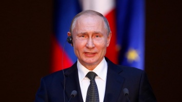 Икона в углу и живые цветы - журналисты провели виртуальную экскурсию по кабинету Путина