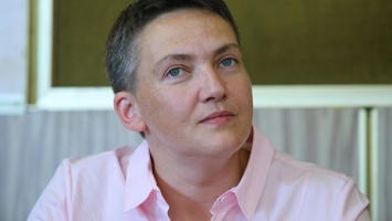 "Женщина-воин": Савченко сменила платье на военный мундир