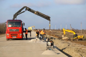 Появились новые фото строительства бетонной дороги в Николаевской области