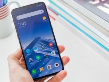 Xiaomi запатентовала смартфон с миниатюрным дисплеем на тыльной стороне