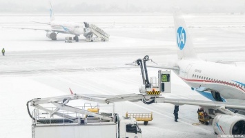 Снегопады парализовали работу аэропортов в США