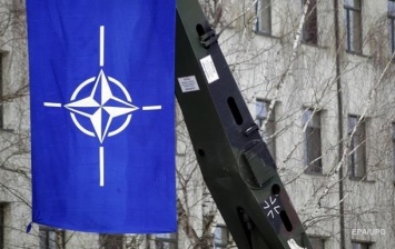 Саммит НАТО назвал угрозой агрессию России, но решил поддерживать диалог