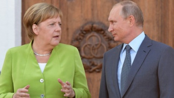 Путин по телефону обсудил обмен пленными с Меркель: что известно