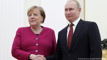 Комментарий: Меркель и Путин - не друзья, но партнеры