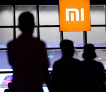 Xiaomi предложила дизайн смартфона с семью выдвижными камерами